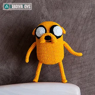 Crocheted yellow cartoon character figure
