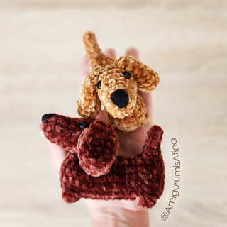 Two cute crocheted dog figures