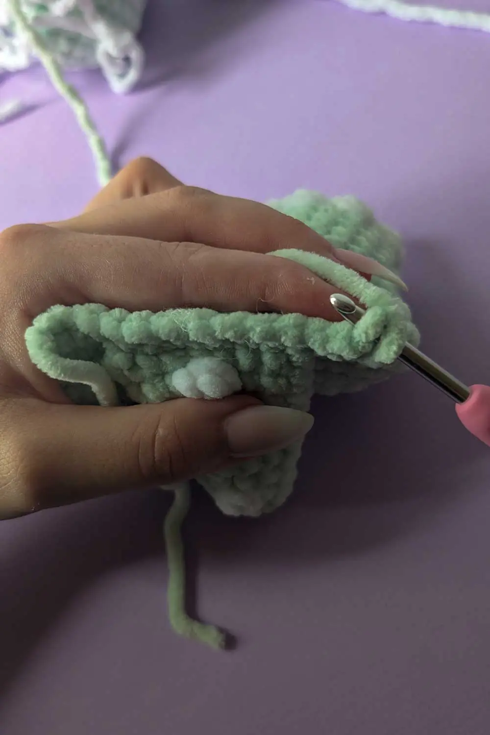 Crocheted dinosaur tail in progress