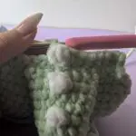 Crocheted dinosaur in progress.