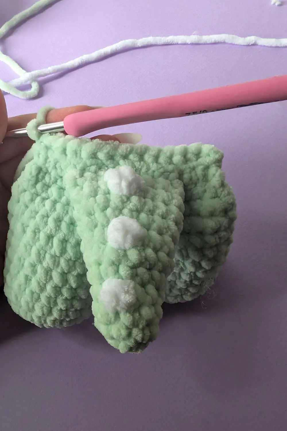 Crocheted dinosaur tail in progress