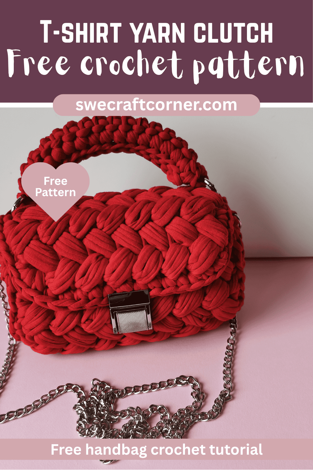A small, bright red crocheted clutch made from T-shirt yarn, featuring a chunky handle and silver chain strap, is displayed on a pink surface. Text reads: T-shirt Yarn Clutch Free crochet pattern and promotes a free tutorial.