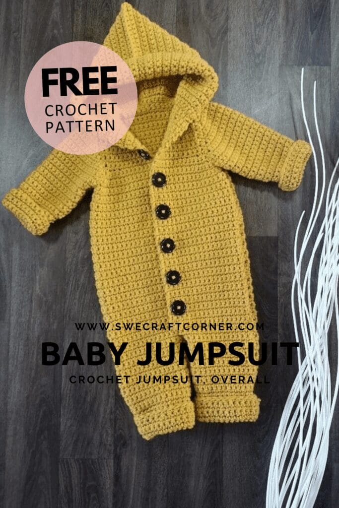 A mustard yellow crocheted baby jumpsuit with a hood and black buttons is displayed on a dark wood floor. The image also suggests using a crochet organizer to keep your supplies handy while making this free pattern from swecraftcorner.com.