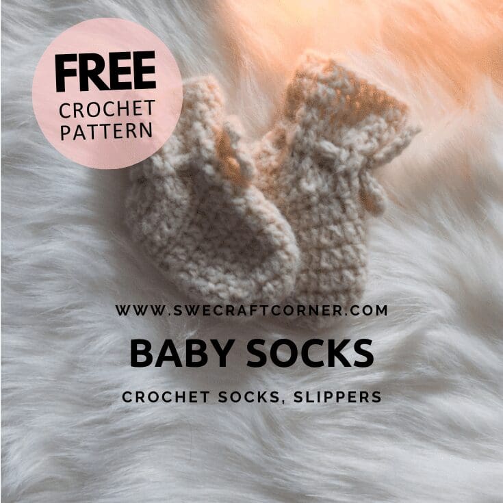 A pair of crocheted baby socks in beige yarn rest on a fluffy white surface, perfect for fans of baby crochet clothes. Text on image: FREE Crochet Pattern, www.swecraftcorner.com, Baby Socks, and Crochet socks, slippers.