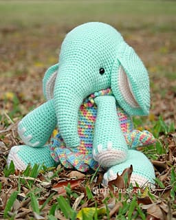 Crocheted elephant toy with blanket