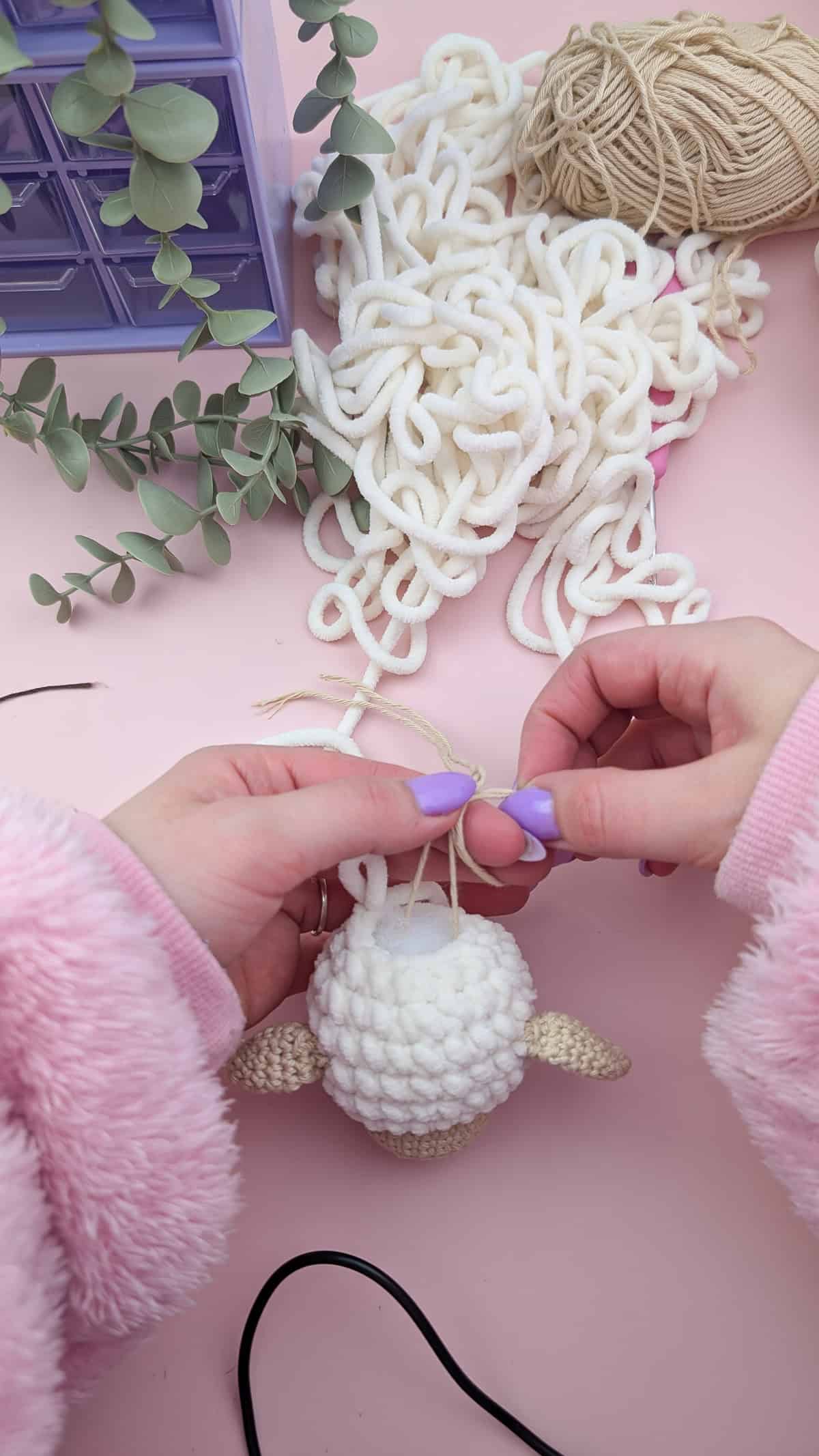 crocheted lamb head in progress